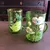 Foto de um(a) Antigas Canecas Murano Vidro Veneziano Mary Gregory Verde, da categoria de Canecas. Par de canecas em Murano veneziano, com linda pintura feita à mão com esmalte e ouro. Estilo Mary Gregory. Ambas em perfeito... Mostrado de uma perspectiva diferente. Vendido no marketplace Trésors.