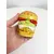Foto de um(a) Saleiro em cerâmica formato hamburguer, da categoria de Saleiros e pimenteiros. Saleiro em cerâmica com tampa na base em silicone. Perfeito estado. Medidas: 7x5cm. Mostrado de uma perspectiva diferente. Vendido no marketplace Trésors.