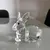 Foto de um(a) Bibelô Escultura De Coelho Em Cristal Tcheco Preciosa Glass, da categoria de Escultura. Bibelô Escultura De Coelho Em Cristal Tcheco Preciosa Glass. Peça esculpida à mão Mede aprox 7x9cm. Mostrado de uma perspectiva diferente. Vendido no marketplace Trésors.