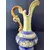 Foto de um(a) Pequena Jarra Blue anos 40, Indústria Brasileira, da categoria de Jarros. Pequena jarra em porcelana com pintura azul cobalto e amarelo perolado, filetada com ouro e grega com trevos também ouro... Mostrado de uma perspectiva diferente. Vendido no marketplace Trésors.