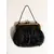 Foto de um(a) Bolsa de Festa Canutilhos e Latão, Década de 1970, da categoria de Bolsas. Bolsa de festa bordada à mão com canutilhos pretos, fecho e corrente em latão com forro em perfeito estado, década de 1970. ... Mostrado de uma perspectiva diferente. Vendido no marketplace Trésors.