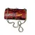 Foto de um(a) Bolsa de Mão em Acrílico Tipo Casco de Tartaruga, da categoria de Outros colecionáveis. Bolsa de festa em acrílico com estampa estilo casco de tartaruga, fecho e corrente em metal oxidado. Medidas: altura 10cm... Vendido no marketplace Trésors.