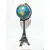 Foto de um(a) Globo Terrestre Eiffel, da categoria de Globos. Globo eiffel. Globo terrestre tendo como base a clássica torre eiffel, em metal com pátina bronze envelhecida e globo em... Mostrado de uma perspectiva diferente. Vendido no marketplace Trésors.