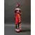 Foto de um(a) Escultura Africana Anos 80, da categoria de Escultura. Escultua africana em madeira policromada com missangas e sementes, década de 1980. A: 30 cm / L: 6,5 cm / P: 4 cm Peso: 248 g. Mostrado de uma perspectiva diferente. Vendido no marketplace Trésors.