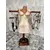 Foto de um(a) Escultura Manequim em Cerâmica, da categoria de Modelos e estatuetas. Escultura em cerâmica de um manequim com varão vem madeira para colocar utensílios com 6 ganchos em cobre. Base em madeira e... Mostrado de uma perspectiva diferente. Vendido no marketplace Trésors.