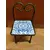 Foto de um(a) Miniatura de Cadeira em Ferro e Azulejo, Década de 2010, da categoria de Modelos e estatuetas. Miniatura de cadeira em ferro com pátina oxidada e um leve dourado, assento em azulejo azul e branco, motivo geométrico,... Mostrado de uma perspectiva diferente. Vendido no marketplace Trésors.