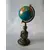 Foto de um(a) Globinho Bronze, da categoria de Globos. Peça única pelo designer marcelus ribas. Globo terrestre com estrutura em madeira e latão com pátina bronze h = 29cm d =... Mostrado de uma perspectiva diferente. Vendido no marketplace Trésors.