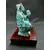Foto de um(a) Escultura Paixão Cortês, da categoria de Escultura. Escultura em resina com pátina azinhabrada, com base em madeira. Um múltiplo que representa a tradição gaúcha marcada pelo... Mostrado de uma perspectiva diferente. Vendido no marketplace Trésors.