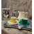 Foto de um(a) Par de Xícaras Gibo Bav anos 50, da categoria de Xícaras. Par de xícaras de cafézinho em porcelana frisada uma amarela e outra verde com filete dourado e resquícios na alça, década... Mostrado de uma perspectiva diferente. Vendido no marketplace Trésors.