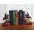 Foto de um(a) Porta Livros Laçador, Paixão Côrtes, Rio Grande do Sul, da categoria de Apoio para livros. Porta livros em alumínio fundido com pátina bronze, base em madeira com imagem do tradicional símbolo da capital gaúcha:... Mostrado de uma perspectiva diferente. Vendido no marketplace Trésors.