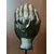 Foto de um(a) Escultura Hand, da categoria de Escultura. Escultura em resina com pátina bronze oxidada, haste em metal e base em madeira ebanizada. Peça única pelo designer marcelus... Mostrado de uma perspectiva diferente. Vendido no marketplace Trésors.