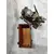 Foto de um(a) Caixa Container Elefante, Década de 1940, da categoria de Cestos e Caixas. Contêiner elefante: caixa de madeira com tampa de elefante em compensado com corte computadorizado com pátina bronze... Mostrado de uma perspectiva diferente. Vendido no marketplace Trésors.