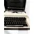 Foto de um(a) Máquina de Escrever Ramington-Ipanema, Década de 1980, da categoria de Maquinas de Escrever. Máquina de detilografia portátil da marca remington ipanema, com caixa original. Um dos expoentes em tecnologia dos anos... Mostrado de uma perspectiva diferente. Vendido no marketplace Trésors.