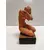 Foto de um(a) Escultura em Terracota, Artista Dante Castelani, 1995, da categoria de Escultura. Escultura em terracota tendo como tema figura feminina com base emmadeira. Artista é dante castelani datada de 1995,... Mostrado de uma perspectiva diferente. Vendido no marketplace Trésors.