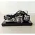 Foto de um(a) Moto Escultura 90'S, da categoria de Modelos e estatuetas. Moto escultura em resina e base em madeira ebanizada, década de 1990. Montagem: designer marcelus ribas A: 10,5 cm / L: 19,5... Mostrado de uma perspectiva diferente. Vendido no marketplace Trésors.