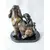 Foto de um(a) Escultura Mamãe e Filhote Basset, da categoria de Escultura. Escultura mamãe basset com filhote, em poli resina italina com pátina bronze oxidada, base em granito preto polido com... Mostrado de uma perspectiva diferente. Vendido no marketplace Trésors.
