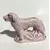 Foto de um(a) Bibelô Collie Anos 40, da categoria de Modelos e estatuetas. Miniatura em porcelana na cor rosa, o clássico bibelô dos anos 1940 A: 8 cm P: 4 cm L: 11 cmPeso: 158 g. Mostrado de uma perspectiva diferente. Vendido no marketplace Trésors.