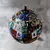 Foto de um(a) Globo Tintim, Herge, da categoria de Globos. Globo tintim globo com esfera giratória de plástico decoupado com imagens do tintim, estrutura em ferro com detalhes em... Mostrado de uma perspectiva diferente. Vendido no marketplace Trésors.