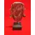 Foto de um(a) Máscara Coral, Buenos Aires, La Boca, Década de 1980, da categoria de Escultura. Máscara em cimento com acabamento descascado na cor coral, brinco feitos com moedas argentinas da década de 1970 e base... Mostrado de uma perspectiva diferente. Vendido no marketplace Trésors.