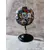 Foto de um(a) Globo Tintim, Herge, da categoria de Globos. Globo tintim globo com esfera giratória de plástico decoupado com imagens do tintim, estrutura em ferro com detalhes em... Mostrado de uma perspectiva diferente. Vendido no marketplace Trésors.