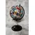 Foto de um(a) Globo Tintim, Herge, da categoria de Globos. Globo tintim globo com esfera giratória de plástico decoupado com imagens do tintim, estrutura em ferro com detalhes em... Mostrado de uma perspectiva diferente. Vendido no marketplace Trésors.