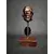 Foto de um(a) Fragmento Rosto Masculino, da categoria de Escultura. Fragmento de escultura de um rosto masculino em gesso com acabamento em bronze envelhecido e base em madeira e couro... Mostrado de uma perspectiva diferente. Vendido no marketplace Trésors.