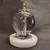 Foto de um(a) Bola de Cristal Decorativa, Década de 2000, da categoria de Outros objetos decorativos. Bola de cristal decorativa com base em mármore branco e ferragens em latão. Para completar, um yorkshire terrier dourado no... Mostrado de uma perspectiva diferente. Vendido no marketplace Trésors.