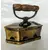 Foto de um(a) Ferro Anos 30, da categoria de Outros colecionáveis. Ferro de passar com banho de latão oxidado com cabo em madeira original, década de 1930 marca fama, indústria brasileira A:... Mostrado de uma perspectiva diferente. Vendido no marketplace Trésors.
