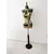 Foto de um(a) Manequim Frida Kahlo, por Marcelus Ribas, da categoria de Outros objetos decorativos. Manequim antigo feito em resina e pé de madeira e metal cromado, customizado com decoupage das obras da artista mexicana... Mostrado de uma perspectiva diferente. Vendido no marketplace Trésors.