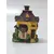 Foto de um(a) Mini Chalé em Resina Italiana, Década de 1990, da categoria de Modelos e estatuetas. Miniatura de chalé em resina italiana policromada dos anos 1990. A: 10 cm L: 7 cm P: 5 cm peso: 257 g. Mostrado de uma perspectiva diferente. Vendido no marketplace Trésors.