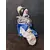 Foto de um(a) Pierrot em Porcelana, Década de 1970, da categoria de Bonecos de arte. Pierrot com cabeça e membros em porcelana, rosto pintado e roupa em cetim azul e branco, colarinho em tule com rendas e... Mostrado de uma perspectiva diferente. Vendido no marketplace Trésors.