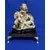 Foto de um(a) Escultura Buddha anos 80, da categoria de Objetos religiosos e espirituais. Buda em resina com pátina envelhecida, base em granito preto e pés dourado metálico. Peça única pelo designer marcelus... Mostrado de uma perspectiva diferente. Vendido no marketplace Trésors.