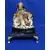 Foto de um(a) Escultura Buda Anos 80, da categoria de Escultura. Buda em gesso com pátina envelhecida, base em granito preto e pés metálico dourado. Peça única pelo designer marcelus ribas.... Mostrado de uma perspectiva diferente. Vendido no marketplace Trésors.