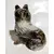 Foto de um(a) Bibelô cão Border Collie Anos 40, da categoria de Modelos e estatuetas. Cachorro da raça border collie em porcelana policromada em em tons de cinza, década de 1940.A: 14 cm / L: 11,5 cm / P: 8 cm... Mostrado de uma perspectiva diferente. Vendido no marketplace Trésors.