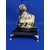 Foto de um(a) Escultura Buddha anos 80, da categoria de Objetos religiosos e espirituais. Buda em resina com pátina envelhecida, base em granito preto e pés dourado metálico. Peça única pelo designer marcelus... Mostrado de uma perspectiva diferente. Vendido no marketplace Trésors.