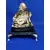 Foto de um(a) Escultura Buddha anos 80, da categoria de Objetos religiosos e espirituais. Buda em resina com pátina envelhecida, base em granito preto e pés dourado metálico. Peça única pelo designer marcelus... Mostrado de uma perspectiva diferente. Vendido no marketplace Trésors.
