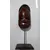 Foto de um(a) Máscara Africana em Madeira, da categoria de Modelos e estatuetas. Máscara africana esculpida em madeira com base também em madeira. Peso: 272g A: 32cm L: 11cm P: 8cm. Mostrado de uma perspectiva diferente. Vendido no marketplace Trésors.