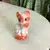 Foto de um(a) Antigo Paliteiro De Gato Em Porcelana Alemã Art Deco, da categoria de Paliteiros. Antigo Paliteiro De Gato Em Porcelana Alemã Art Dec. Peça de coleção Século XX. Mede aprox 6cm. Mostrado de uma perspectiva diferente. Vendido no marketplace Trésors.