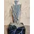 Foto de um(a) Escultura Simone K Lempke, da categoria de Escultura. Escultura em latão e ferro oxidado com base em madeira marmorizada, obra da renomada escultura gaúcha simone kaiserman... Mostrado de uma perspectiva diferente. Vendido no marketplace Trésors.