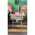 Foto de um(a) Mesinha lateral pés pata de leão em bronze, da categoria de Mesas laterais. Medidas: 52A x 47L x 39P acabamentos em couro, pés em bronze em formato de pata de leão e aberturas laterais. Mostrado de uma perspectiva diferente. Vendido no marketplace Trésors.