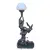 Foto de um(a) ​Luminária de mesa escultórica em estilo Art Déco, da categoria de Abajures. Luminária de mesa escultórica em estilo Art Déco, feita em liga metálica comumente conhecida como petit-bronze. Composição... Vendido no marketplace Trésors.
