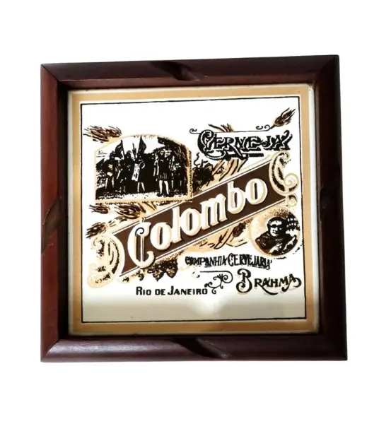 Foto de um(a) Quadro Azulejo Colombo 80'S, da categoria de Pratos Decorativos. Quadro de azulejo ou cinzeiro com moldura em madeira, da companhia de cerveja colombo, rio de janeiro, década de 1980 a... Vendido no marketplace Trésors.
