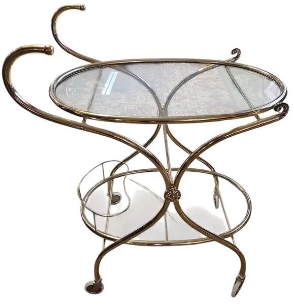 Foto de um(a) Carrinho de Chá Italiano – Bronze e Latão com Vidro Temperado, da categoria de Carrinhos de bar e auxiliares. Exemplar sofisticado do design europeu, este carrinho de chá (ou carrinho bar) combina a robustez do bronze com o brilho... Mostrado de uma perspectiva diferente. Vendido no marketplace Trésors.