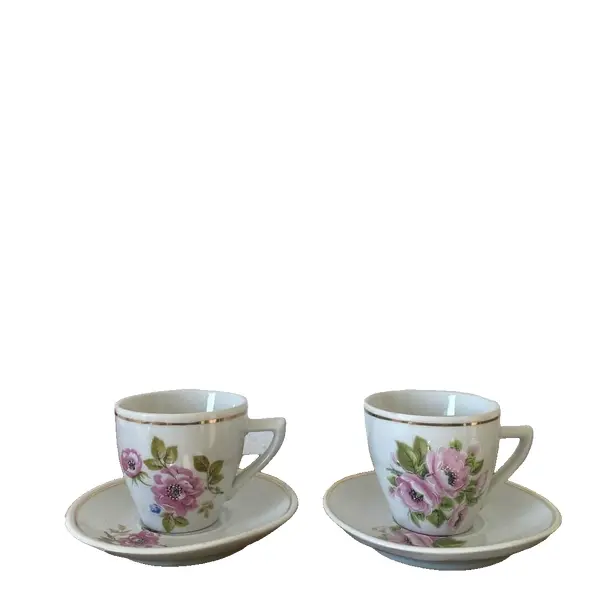 Foto de um(a) Dupla de xícaras Pozzani, da categoria de Xícaras. Dupla de xícaras de porcelana para cafézinho, Pozzani. 5cm de altura. Pires: 10cm de diâmetro. Vendido no marketplace Trésors.