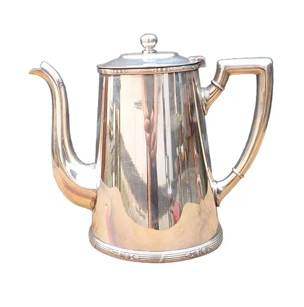 Foto de um(a) Antigo bule de prata art deco, da categoria de Bules. Antigo bule de prata art decoDimensões: Altura: 19Largura: 24Profundidade: 10. Vendido no marketplace Trésors.