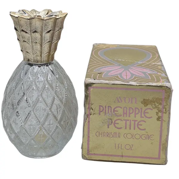 Foto de um(a) Perfume Avon Abacaxi Vintage, da categoria de Outros colecionáveis. Perfume Avon Abacaxi vintage. Mostrado de uma perspectiva diferente. Vendido no marketplace Trésors.