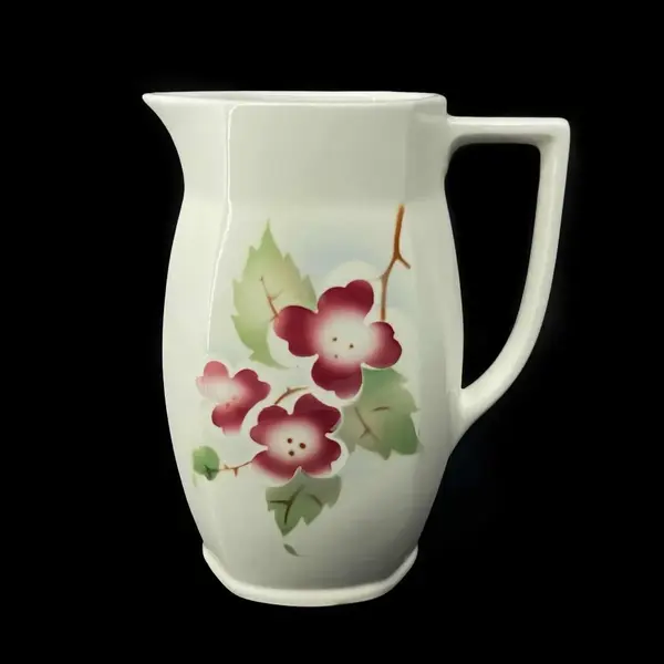 Foto de um(a) Antiga Jarra Art Deco Porcelana Faiança Majólica Alemã, da categoria de Jarros. Antiga jarra em faiança/majólica alemã. Decoração floral típica do período Art Deco. Peça numerada.Medidas 16x13cm. Mostrado de uma perspectiva diferente. Vendido no marketplace Trésors.