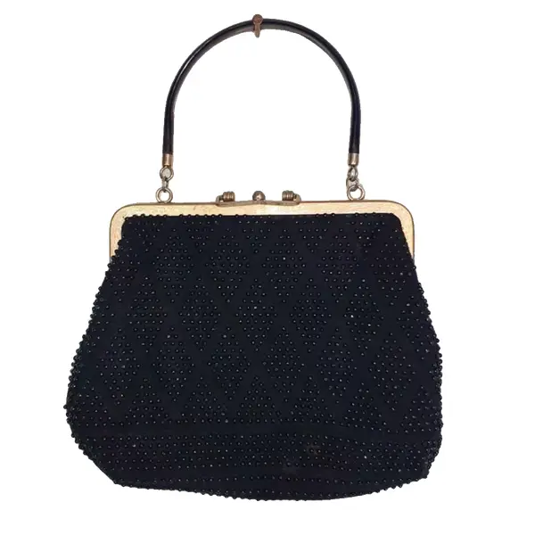 Foto de um(a) Bolsa de mão dupla face bolinhas vintage anos 50, da categoria de Bolsas. atenção- esse produto apresenta pequenas avarias- leia a descrição Peça antiga/vintage - usada, de brechó Produto fabricado... Vendido no marketplace Trésors.