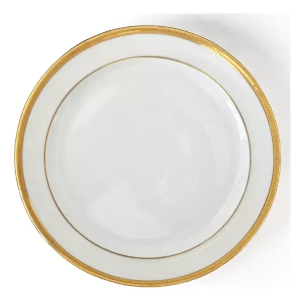Foto de um(a) Prato raso em porcelana Limoges, da categoria de Pratos. Prato raso para salada em porcelana Limoges branca filetada a ouro. Limoges Unic 12 Rue de Paradis PARIS. França século XX.... Mostrado de uma perspectiva diferente. Vendido no marketplace Trésors.
