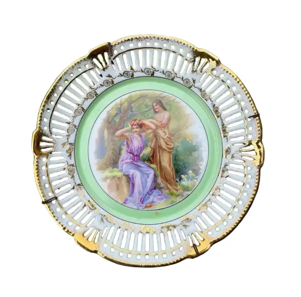 Foto de um(a) Antigo Raro Prato Decorativo Em Porcelana Alemã Fenestrado, da categoria de Pratos Decorativos. Bavaria - Germany. Antigo prato decorativo em porcelana artística alemã, borda fenestrada e linda decoração com cena de... Vendido no marketplace Trésors.